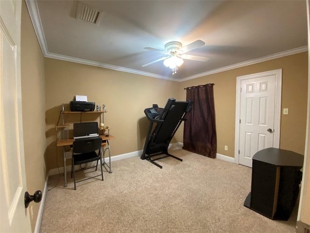 exercise room featuring visible vents, a ceiling fan, carpet floors, crown molding, and baseboards