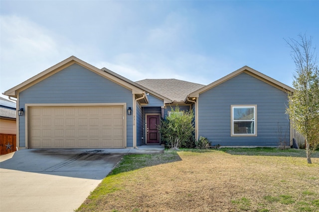 ranch-style home featuring a garage, a front yard, concrete driveway, and roof with shingles