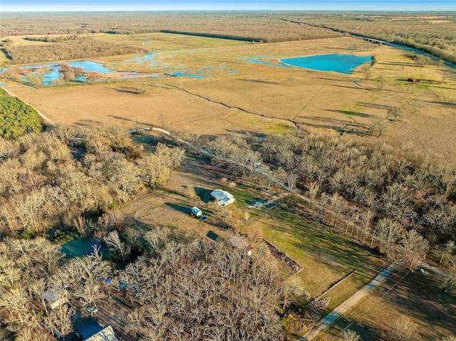 drone / aerial view with a water view and a rural view