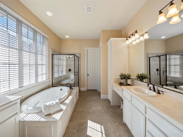 full bath with a stall shower, tile patterned flooring, visible vents, and a tub with jets