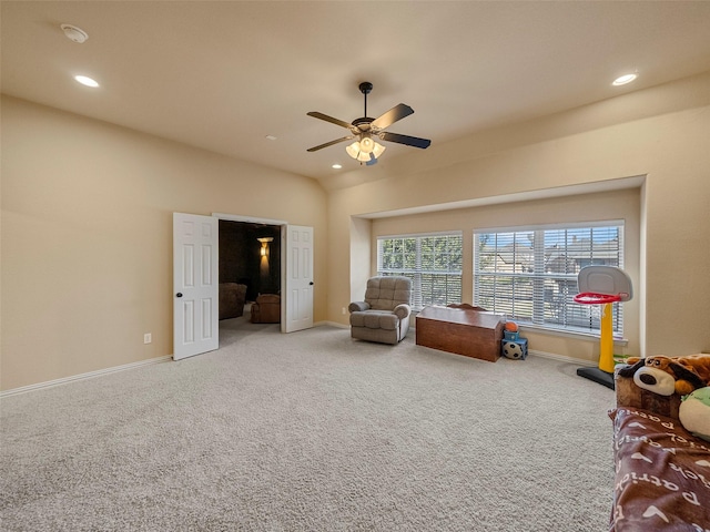 living area with baseboards, vaulted ceiling, carpet, and recessed lighting