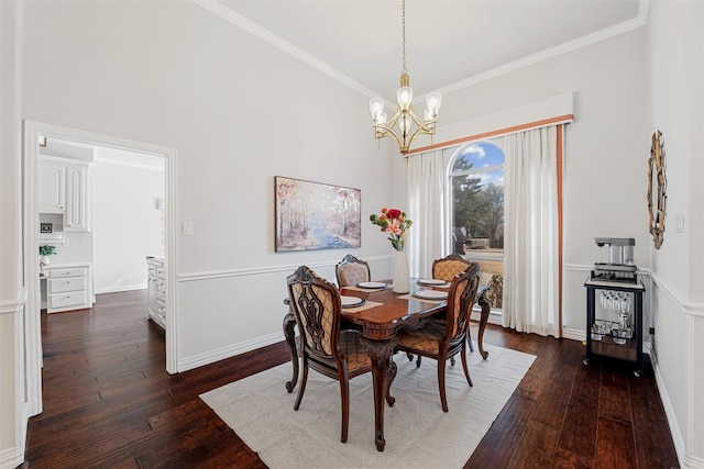 dining area with baseboards, wood-type flooring, ornamental molding, high vaulted ceiling, and a notable chandelier