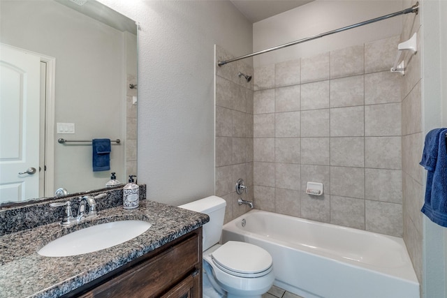 full bath with tub / shower combination, toilet, and vanity