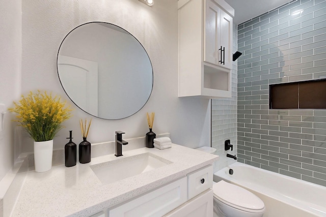 bathroom with toilet, washtub / shower combination, and vanity