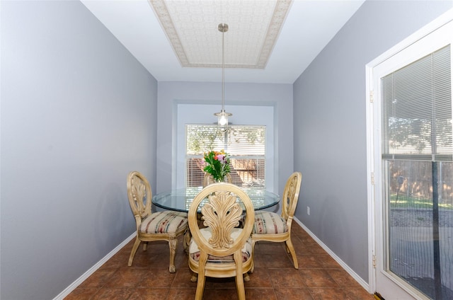 dining room with baseboards