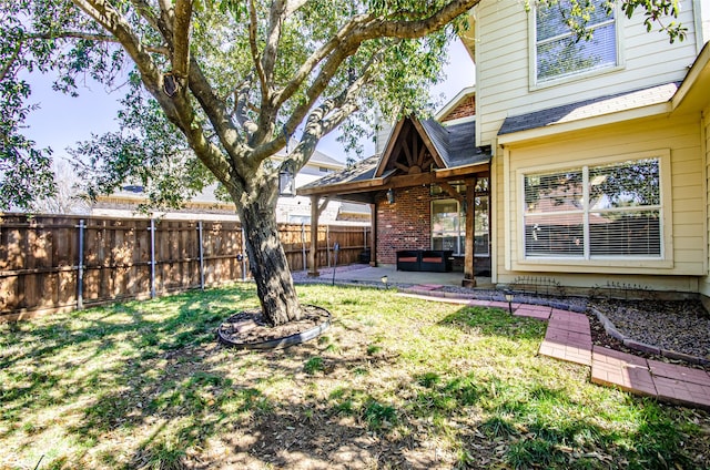 view of yard featuring a fenced backyard and a patio