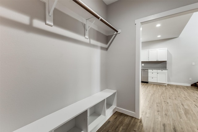 spacious closet with wood finished floors