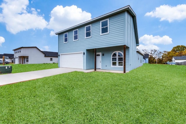 view of front facade with driveway, a garage, and a front yard