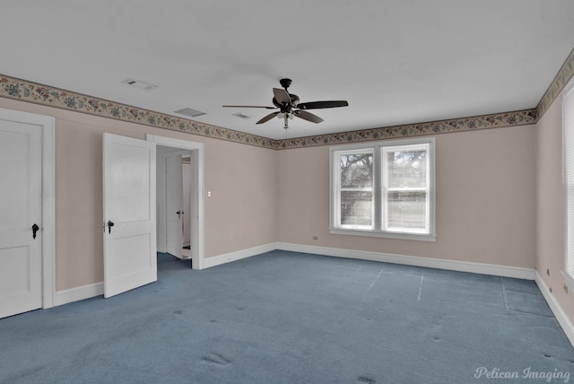 unfurnished bedroom with carpet floors, visible vents, baseboards, and a ceiling fan