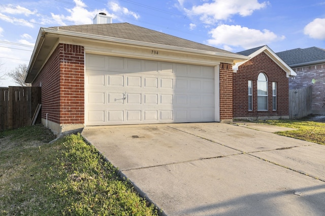 ranch-style house featuring a garage, brick siding, fence, concrete driveway, and a chimney