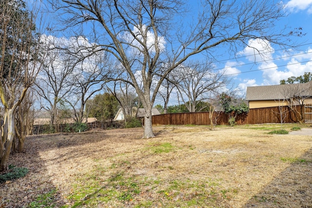 view of yard featuring fence