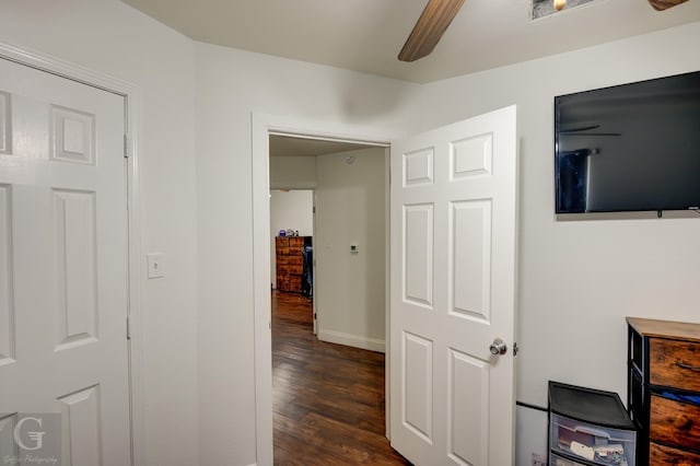 hall featuring dark wood-type flooring