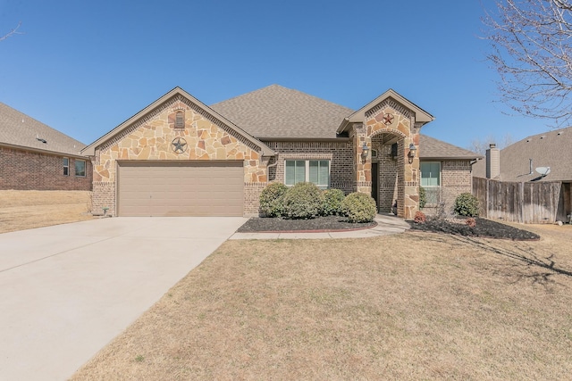 view of front facade featuring driveway, an attached garage, a shingled roof, and brick siding