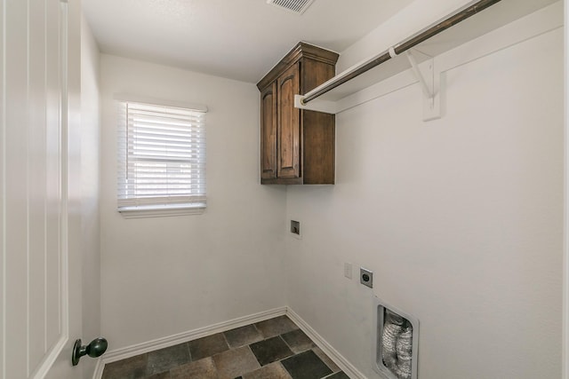 clothes washing area featuring hookup for a washing machine, visible vents, cabinet space, electric dryer hookup, and baseboards