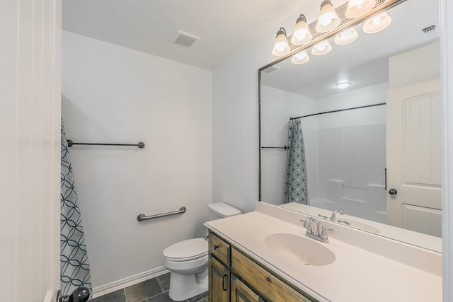 bathroom with toilet, a shower with shower curtain, visible vents, vanity, and baseboards