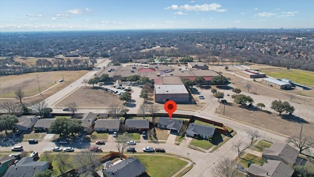 birds eye view of property with a residential view