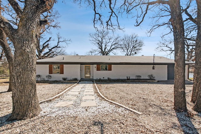 view of front of house featuring brick siding