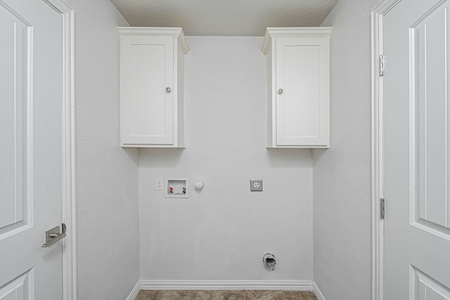 clothes washing area featuring gas dryer hookup, baseboards, washer hookup, and hookup for an electric dryer