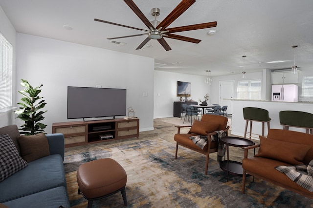 305 W Johnson St, Denison, TX 75020 - living area with a ceiling fan
