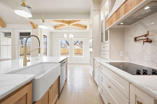 kitchen featuring decorative backsplash, glass insert cabinets, black electric cooktop, premium range hood, and stainless steel dishwasher