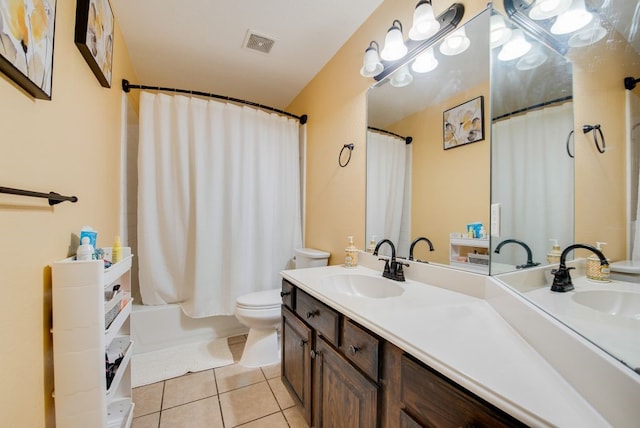 full bath with tile patterned flooring, visible vents, a sink, and double vanity