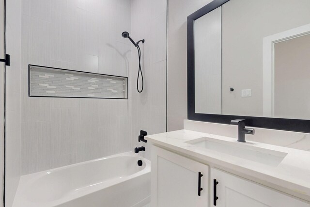 bathroom with shower / washtub combination and vanity