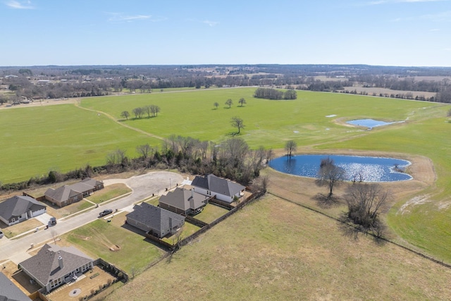 bird's eye view featuring a rural view and a water view