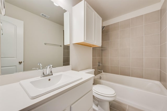 full bathroom with toilet, bathing tub / shower combination, vanity, and visible vents