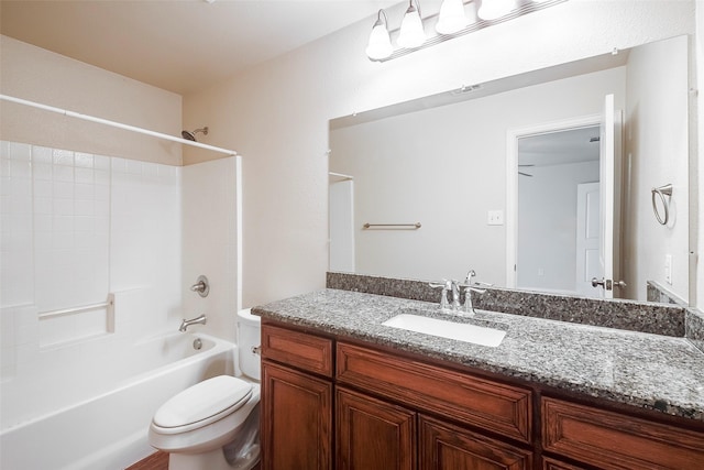 full bath with washtub / shower combination, vanity, and toilet