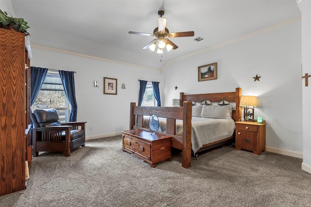 bedroom featuring ornamental molding, carpet, visible vents, and baseboards