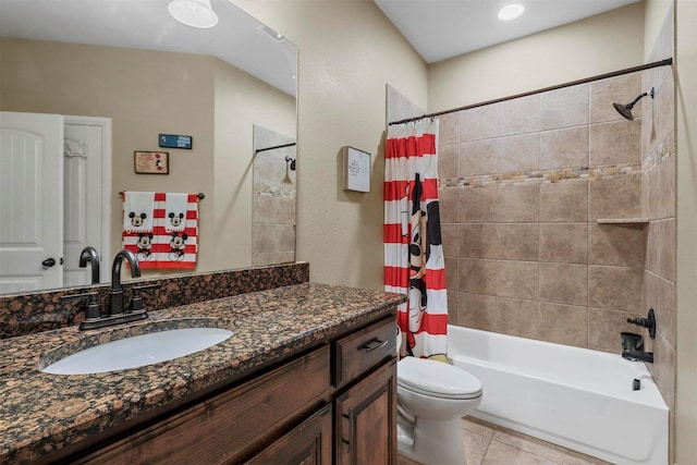 bathroom featuring toilet, tile patterned flooring, shower / bath combination with curtain, and vanity