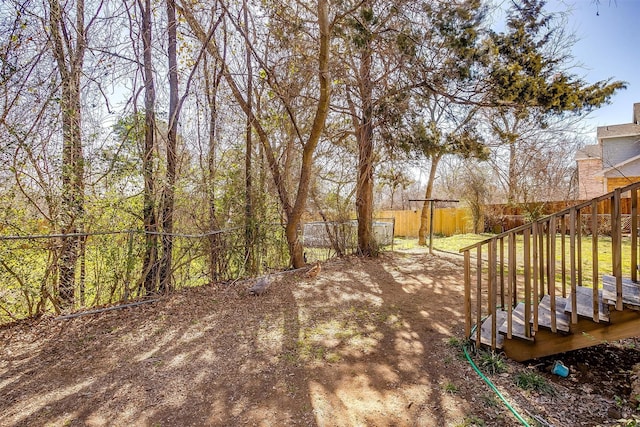 view of yard featuring fence