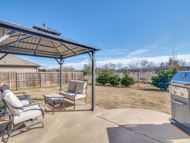 view of patio with a fenced backyard and an outdoor living space