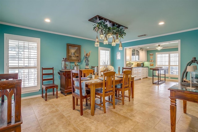 dining space with light tile patterned floors, recessed lighting, visible vents, baseboards, and ornamental molding