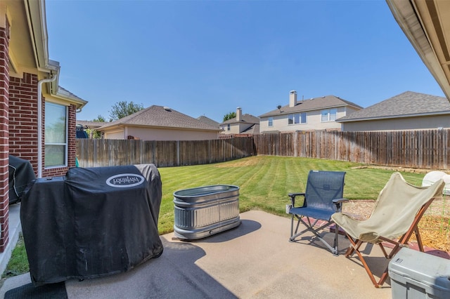 view of patio / terrace featuring a fenced backyard and area for grilling