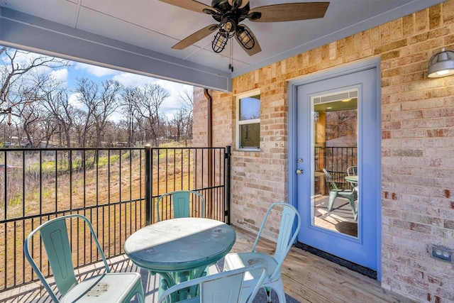 balcony featuring ceiling fan