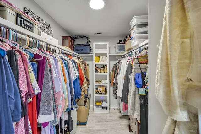 walk in closet featuring visible vents