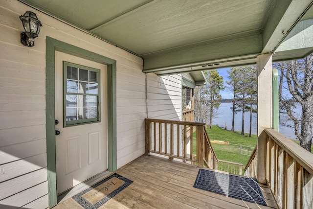 property entrance with a water view