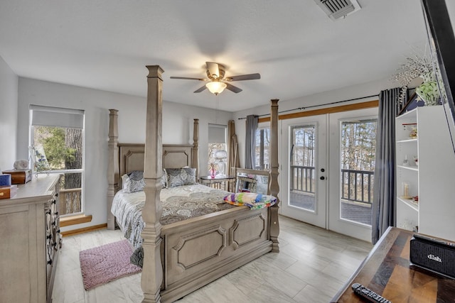 bedroom featuring access to exterior, multiple windows, visible vents, and french doors