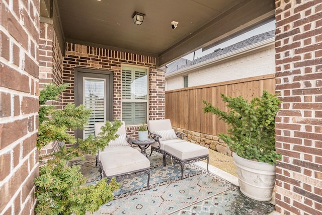 view of patio / terrace with fence