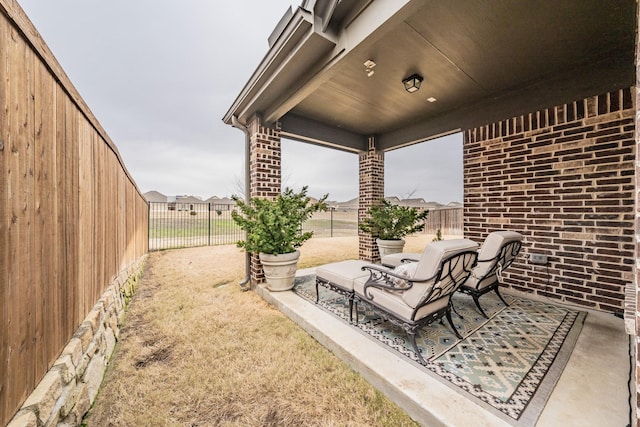 view of patio with a fenced backyard