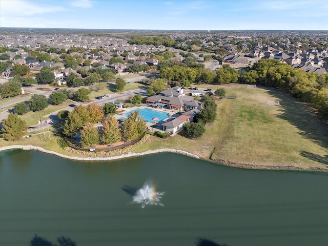 aerial view featuring a residential view and a water view