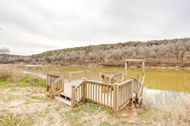 deck featuring a water view