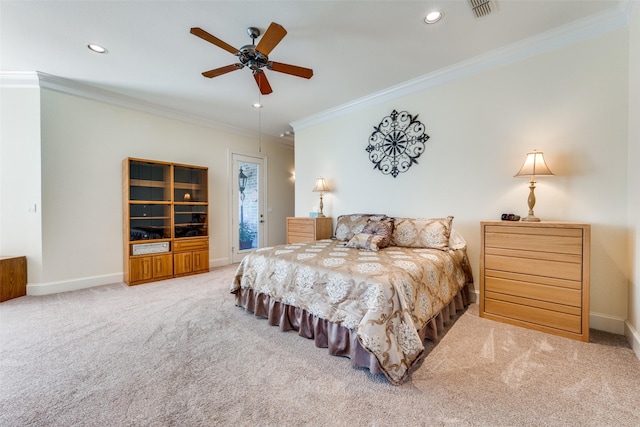 bedroom featuring ornamental molding, carpet flooring, visible vents, and baseboards