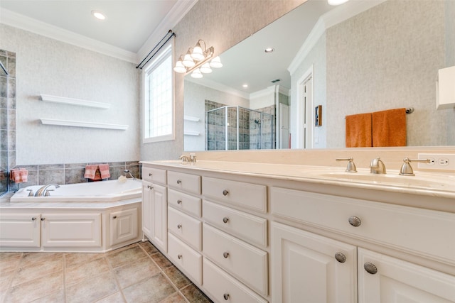 full bathroom with double vanity, ornamental molding, a stall shower, a sink, and a bath