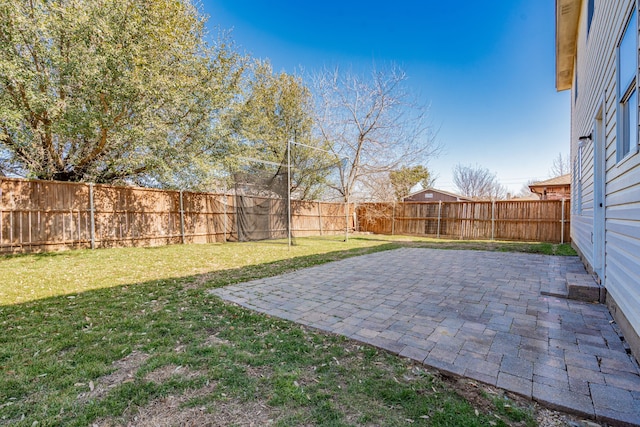 view of yard with a patio and a fenced backyard