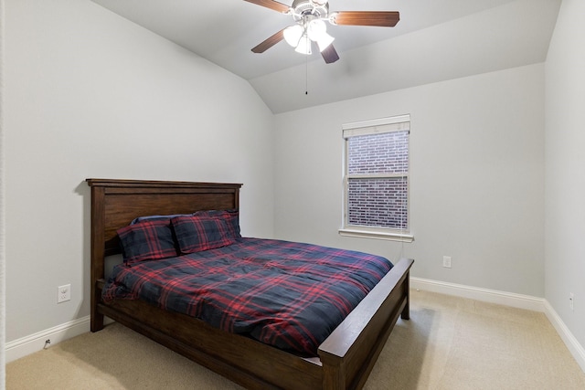 bedroom featuring lofted ceiling, ceiling fan, carpet flooring, and baseboards