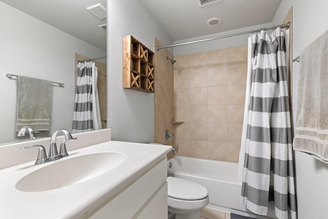 bathroom with toilet, shower / tub combo, visible vents, and vanity