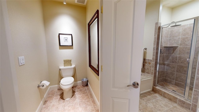 full bathroom with toilet, visible vents, baseboards, tile patterned floors, and a stall shower