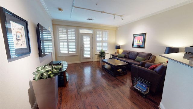 living area with baseboards, visible vents, ornamental molding, and dark wood-type flooring